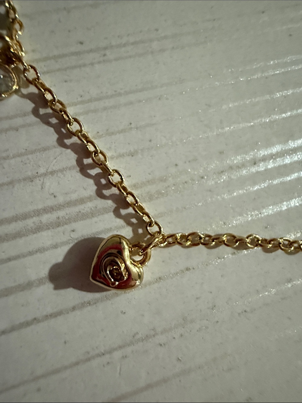 This is a Coach Mini Icons gold-tone charm bracelet. NWT $128 - Picture 3 of 6